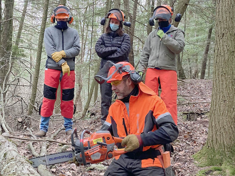 John Adler demonstrates how to cut logs safely and efficiently in the Basic Chainsaw Use and Safety course.