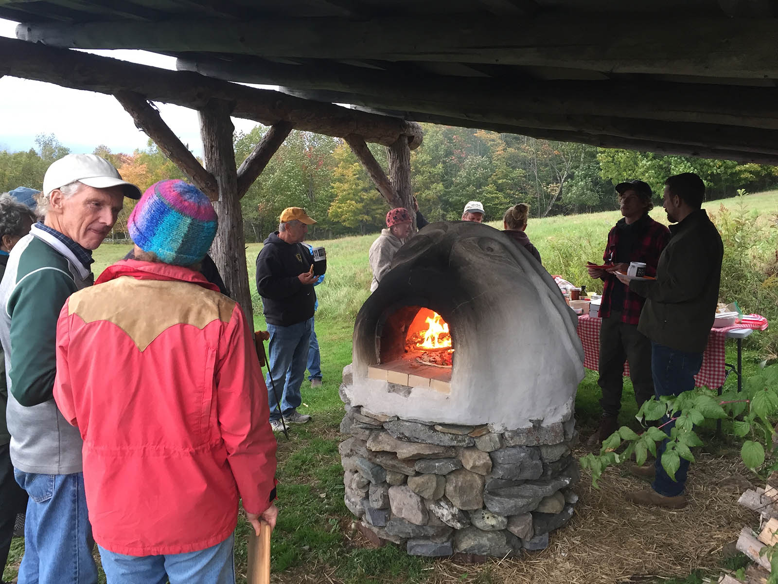 VFF Landowners bring their favorite locally harvested toppings for wood-fired pizzas at the annual VFF forest landowner gathering.